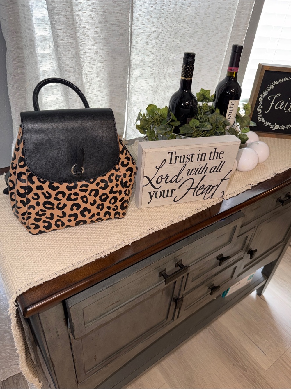 Kate Spade New York Adel Medium Flap Backpack in a Graphic Leopard Print with